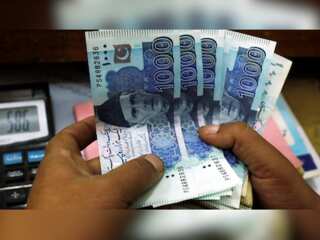 IMF to Pakistan: Time to take ‘required actions’; rupee devalued at Rs 220 against a dollar
