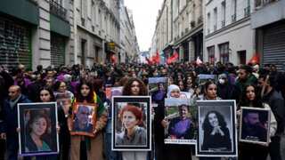 Paris shooting suspect charged as tribute rallies take place in France