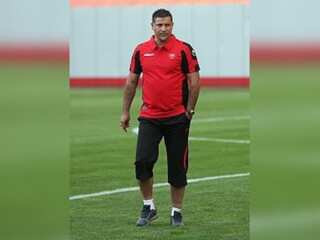 Iranian football legend Ali Daei says family ordered off flight, barred from leaving country