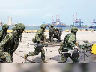 Taiwan to extend compulsory military service as China shows air power