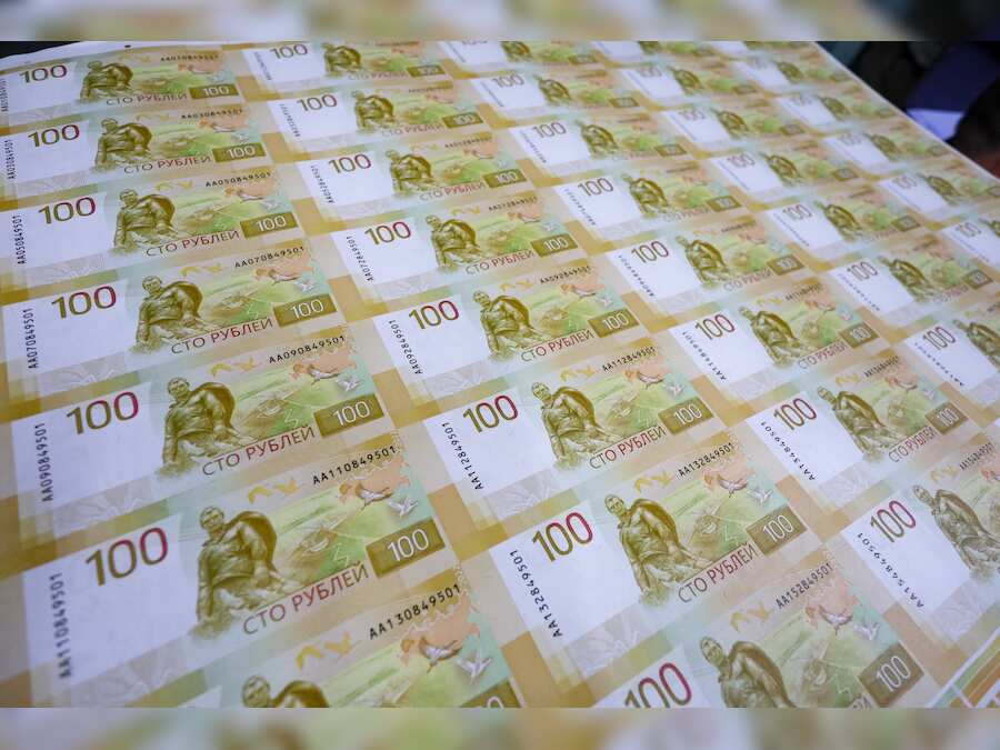 World Business Watch: Russian rouble slumps around 3% vs dollar as sanctions weigh
