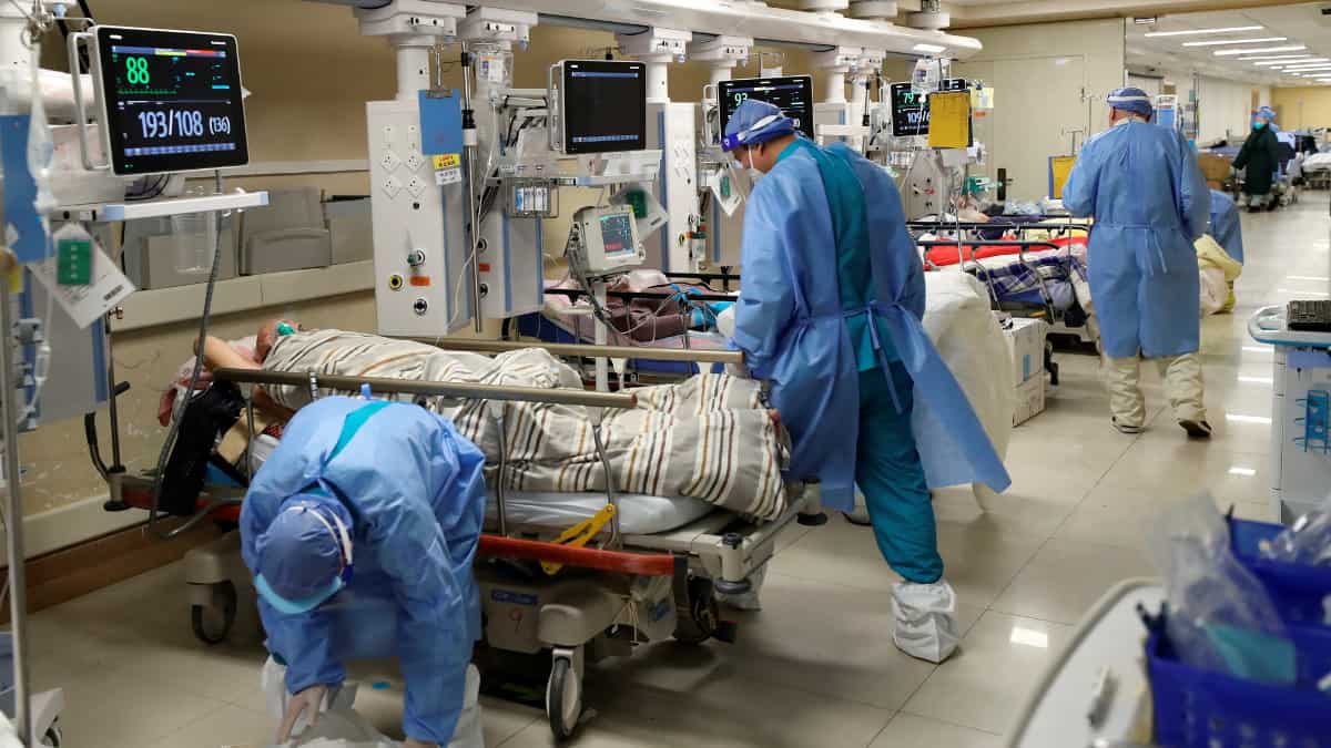 China’s funeral homes, hospitals overwhelmed even as official Covid figures remain low