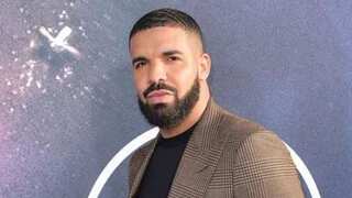 Drake requests fans not to toss bras on stage as his son Adonis attends his LA concert