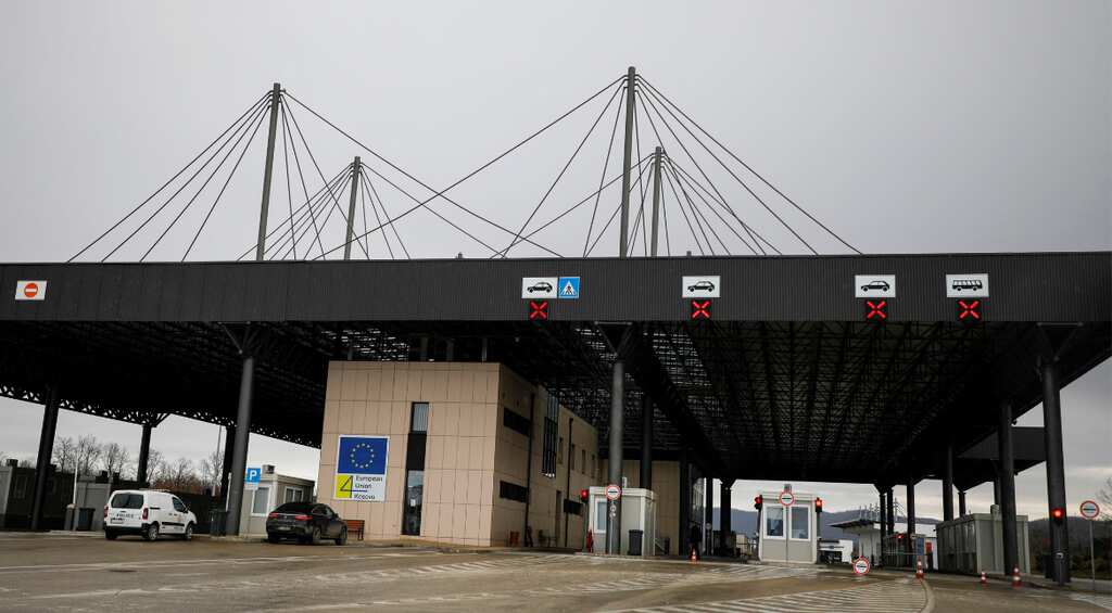 Serbs remove roadblock between Kosovo and Serbia border crossing as tensions ease