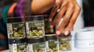 In a first, New York opens its legal recreational marijuana shop
