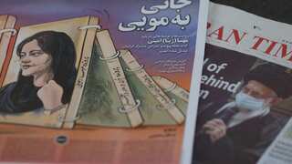 Women must wear headscarves even in cars, Iranian police resume warnings