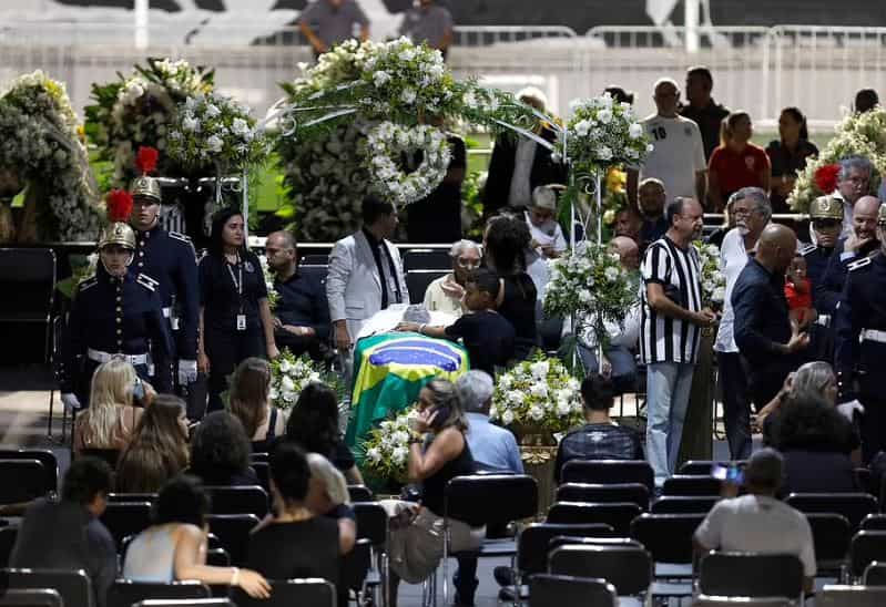 Brazil bids goodbye to football legend Pele with a 24-hour wake in Santos, Sao Paulo