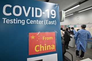 China warns of 'counter-measures' against countries seeking negative Covid test from flyers   