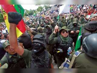 Bolivian police targeted with fireworks as protests enter sixth day