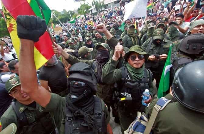 Bolivian police targeted with fireworks as protests enter sixth day