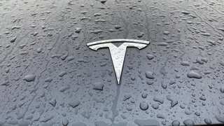 Driver of Tesla that fell 250 feet off California cliff arrested; all four occupants survived the fall