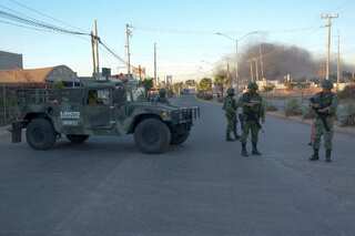 Mexico govt says 29 killed in operation to arrest drug kingpin El Chapo's son
