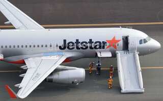 Jetstar flight makes emergency landing in Japan after bomb threat; five injured during evacuation