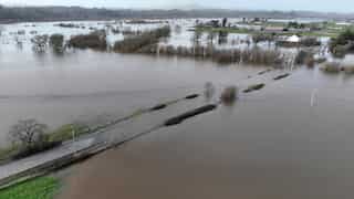 California flash floods: Death toll reaches 14, road-bridge collapses in river