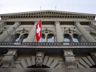 World Business Watch: Swiss central bank posts biggest loss in 116 years