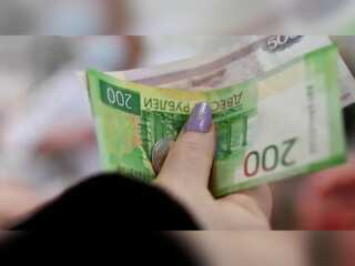 Russia's budget gap surges to record high in December