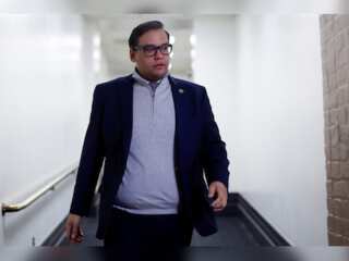Embattled George Santos refuses to resign amid calls for him to step down