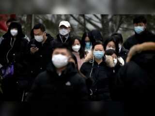 China reports nearly 60,000 Covid deaths