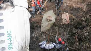 Nepal plane crash: 70 bodies retrieved as rescuers search for two missing passengers