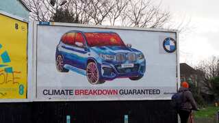 Climate activists target billboards of car companies to highlight 'misleading adverts'
