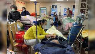 China Covid: WHO says China reports big jump in Covid hospitalisations by 70%