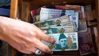 Pakistani rupee slumps 9.6% to historic low against US dollar as nation seeks IMF bailout