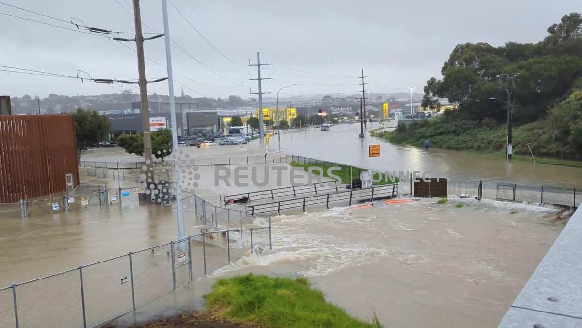 Rescuers carrying out evacuations as people trapped in floodwater