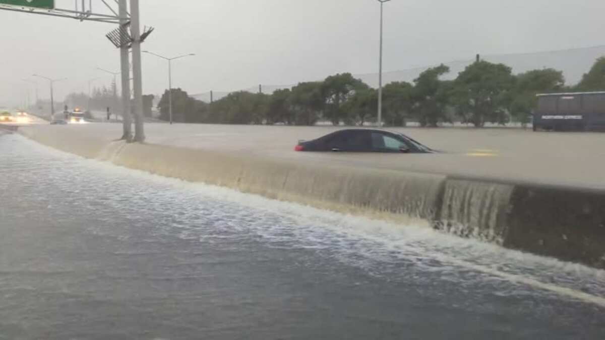 Roads inundated, red heavy rain warning issued for Auckland as region gets record rains