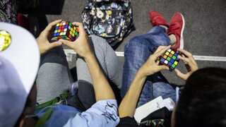 Rubik’s cube fans descend in Glasgow to compete at 'speedcubing'