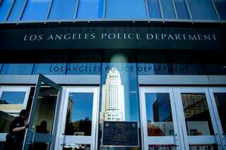 Los Angeles police officer who said ‘happy hunting’ before shooting suspended