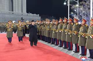North Korea shows off largest-ever number of nuclear missiles at nighttime parade