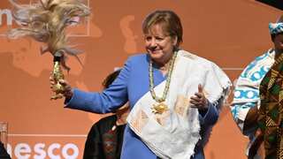 Merkel awarded UNESCO peace prize for opening Germany to refugees