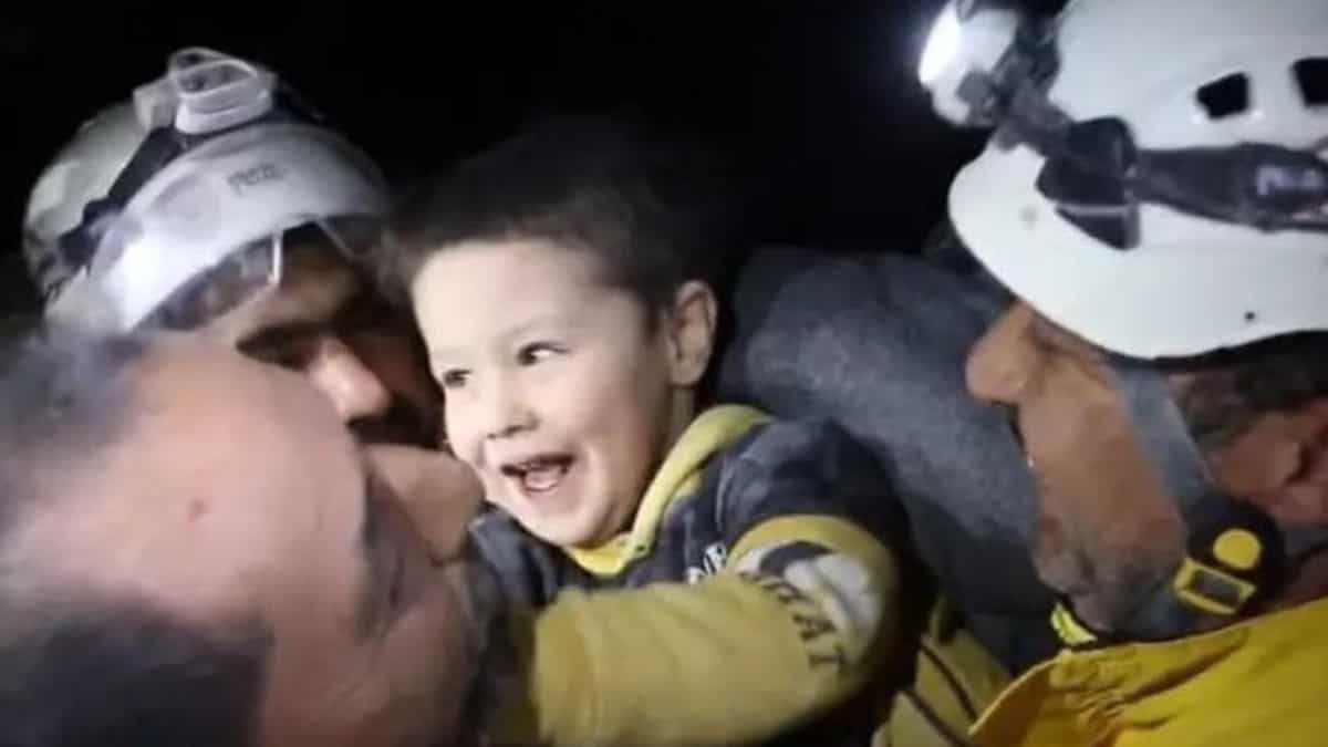 Syrian child smiles after being trapped in rubble for 4 days