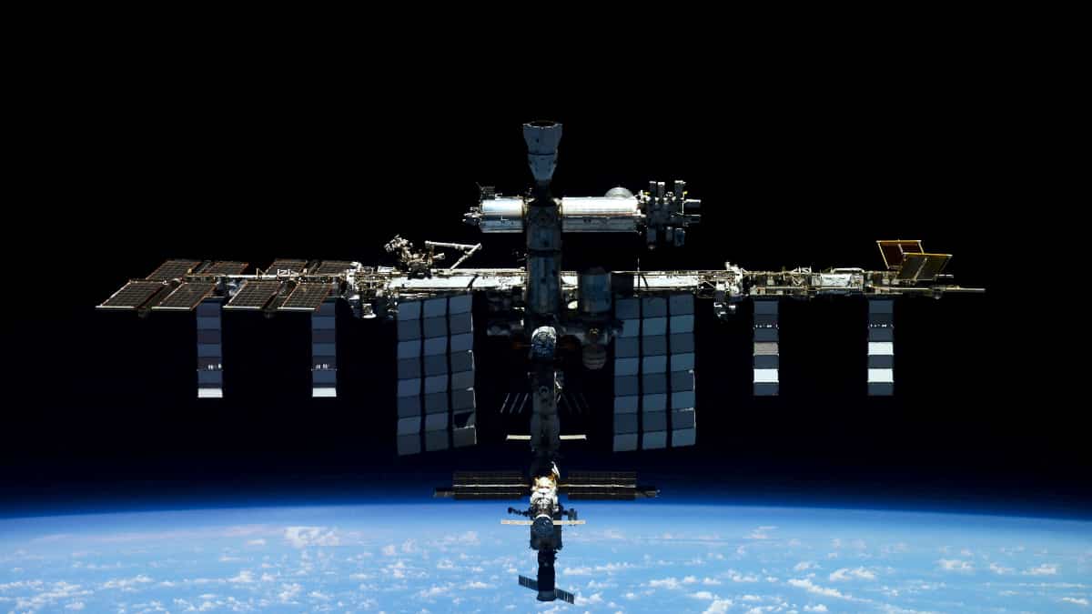 Russian agency reports pressure glitch on spacecraft docked to ISS, says crew safe Russian agency reports pressure glitch on spacecraft docked to ISS, says crew safe