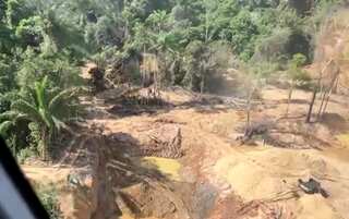 Brazilian authorities drive away illegal miners from Yanomami land in the Amazon