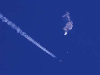 Officials puzzled over objects flying in U.S. & Canada