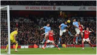 Man City move to top of Premier League with 3-1 win over title rivals Arsenal