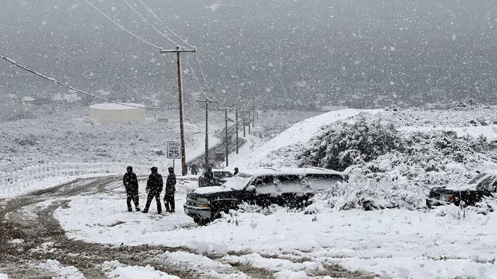 Rare winter storm wreaks havoc in California, as LA remains blanketed in snow