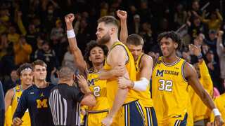 College Basketball: Wisconsin loses to Michigan in OT