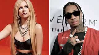 Avril Lavigne spotted kissing Tyga at Paris Fashion Week days after confirming break up with Mod Sun