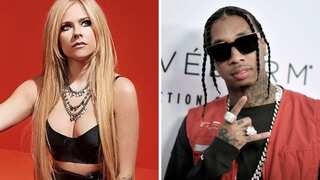 Avril Lavigne spotted kissing Tyga at Paris Fashion Week days after confirming break up with Mod Sun