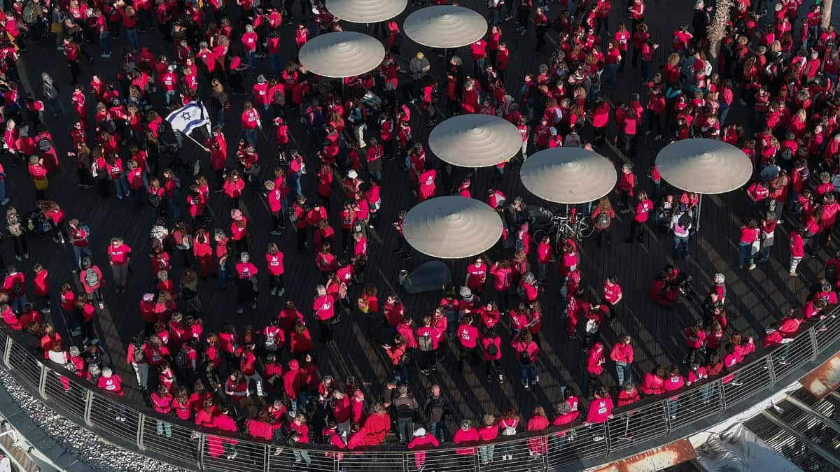Women dressed in red form human chains to protest judicial overhaul in Israel Women dressed in red form human chains to protest judicial overhaul in Israel