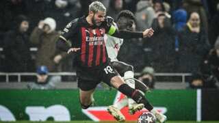 Milan hold off toothless Tottenham to reach Champions League quarter-finals