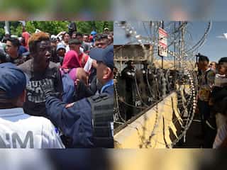 Hundreds of migrants attempt to force their way into USA at the Mexico border crossing