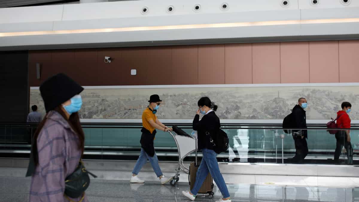 China removes visa curbs on foreign travellers China removes visa curbs on foreign travellers
