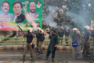 Toshakhana case: Police, PTI workers clash outside ex-PM Imran Khan’s house ahead of possible arrest