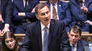 UK unveils cost-of-living budget with focus on childcare, pensions and welfare