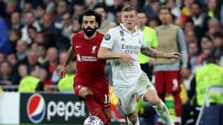 Benzema guides Madrid past Liverpool to reach Champions League quarters