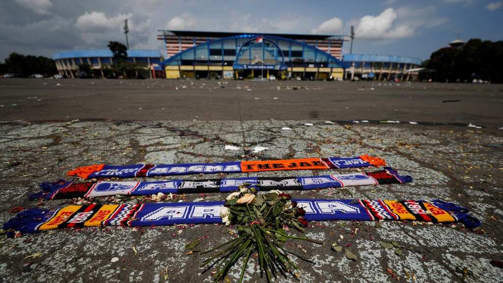 Victims' families 'hurt' as Indonesia court acquits two following verdict in football stampede case