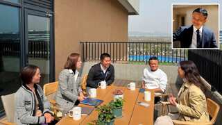 Jack Ma returns to China after nearly a year of overseas travel, visits a school